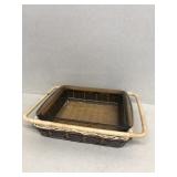 Casserole dish with basket holder