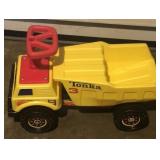 Child Tonka plastic ride toy