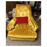 Yellow Mid-century style chair on rollers