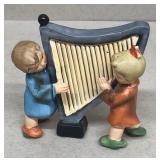 Figurine playing harp