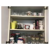 Drinking glasses coffee mugs contents of cabinet