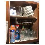 Jars scales contents of cabinet