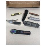 Group of pocket knives in switchblade