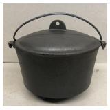 Cast-iron three footed pot with lid, new