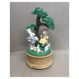 Musical rabbits swinging in trees