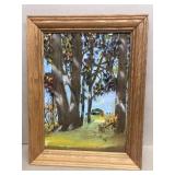 Painting on board of house in woods