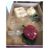 Apple, candleholders, glass dishes
