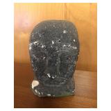 Heads Cement statue