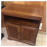 Microwave cabinet with twist top