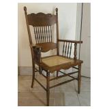 Oak Pressed Back Arm Chair With Cane Seat
