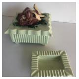Floral trimmed box in the ashtray