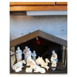 Nativity Set With Ceramic Figurines And Wooden