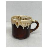 Brown and white cup