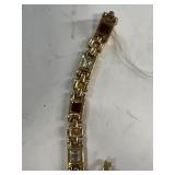 Ruby and clear colored stone bracelet