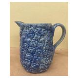 Blue pottery pitcher