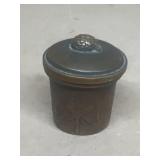 Cast iron dish with lid hole in bottom as made