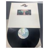 The Doobie Brothers talking into the street