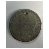 1921 Morgan silver dollar has a hole in it