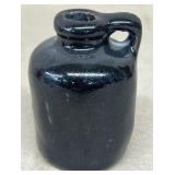 Miniature stoneware brown jug