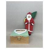 Wooden heart shaped box and wooden Santa Claus