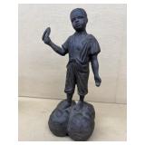 Cast-iron boy worker