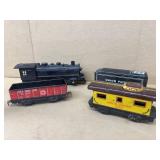 Tin toy train and engine