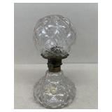 Clear, glass oil lamp