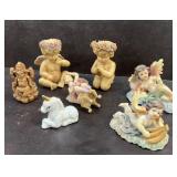 Angels and unicorn figurine