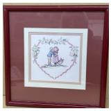 Frame print of little boy, kissing girl