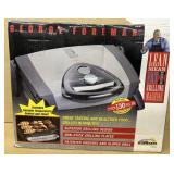 George Foreman mean, fat grilling machine