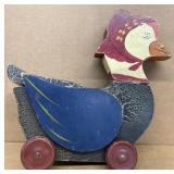 Folk Art wooden duck missing one wheel