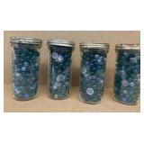 (4) freezer jars full of marbles