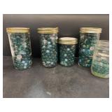 Freezer jars of marbles
