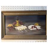 Painting on canvas of glasses and flowers and