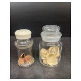 Jar of pennies and seashells