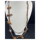 Wood carved animal necklace