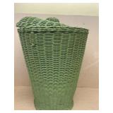 Green wicker waste basket