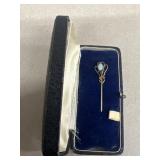 Antique stick pan with powder blue stone