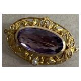Purple stone brooch