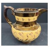 English copper lusterware pitchers with gold