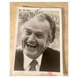 Red skeleton autographed black-and-white photo