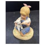 Denim days, girl, feeding lamb