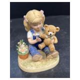 Denim days, girl with teddy bear