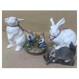 Raccoon, rabbits and butterfly catching figurines