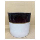 Brown and white stoneware crock