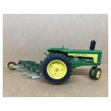 John Deere 1/16 skilled tractor with plow