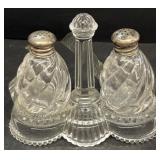 Salt and pepper shakers with sterling silver lids