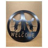 Welcome, sign, dogs looking up tree