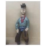 Hand carved wooden cowboy