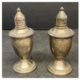 Weighted sterling silver salt and pepper shakers